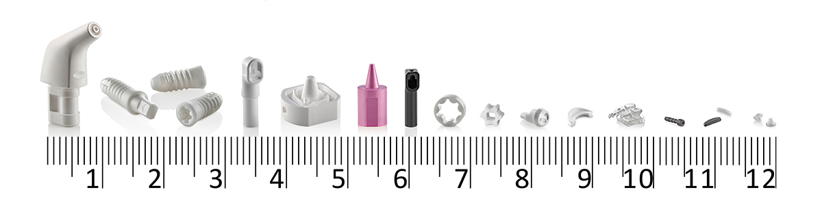 various small ceramic parts on scale
